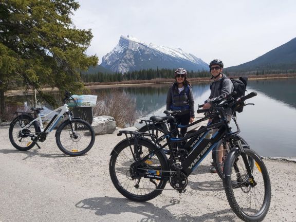 e-bikes in front of mountain lake