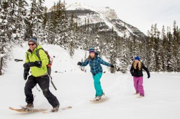 Snowshoeing with traditional snowshoes, photo credit Dan Evans