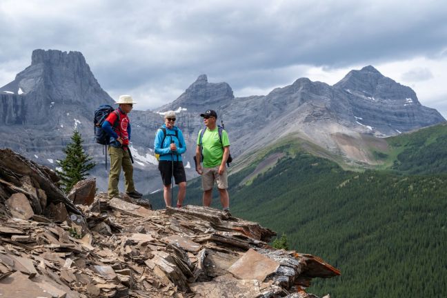 Hikers take in the view with Fortress Mountain in background